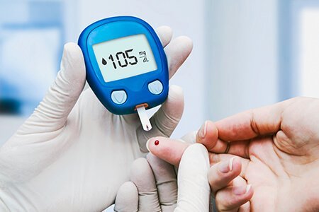 Blood sugar test being performed at Vasavi Hospitals for accurate diabetes diagnosis and care.