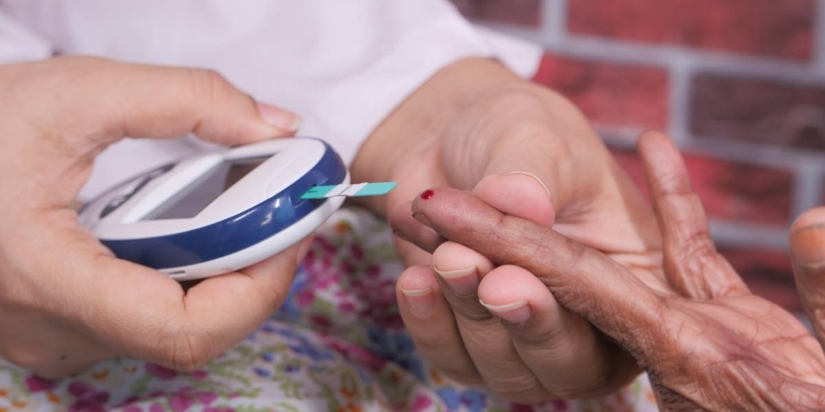 Elderly patient receiving diabetes check-up and care at Vasavi Hospitals endocrinology department.