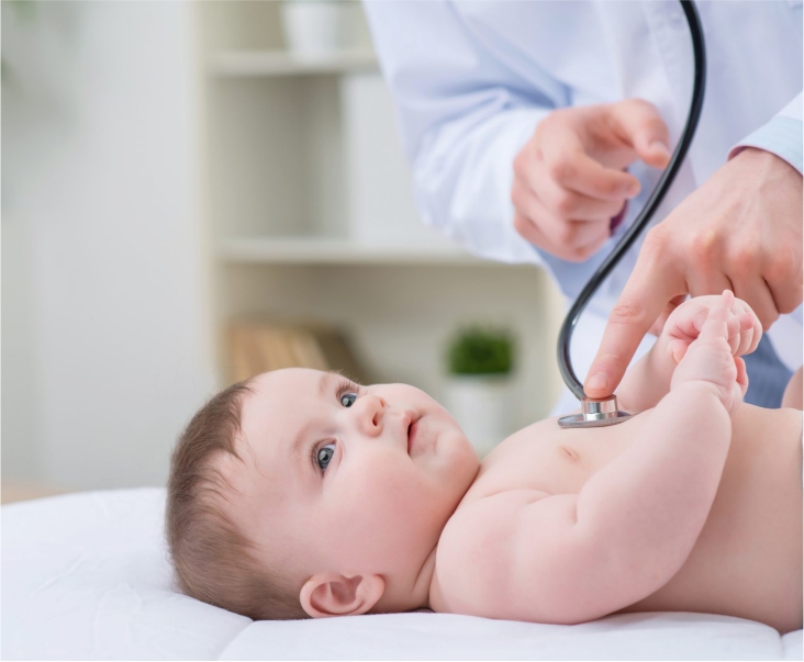 Pediatrician checking baby health at Vasavi Hospitals Bangalore