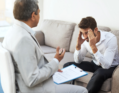 Psychiatrist counseling patient with stress issues